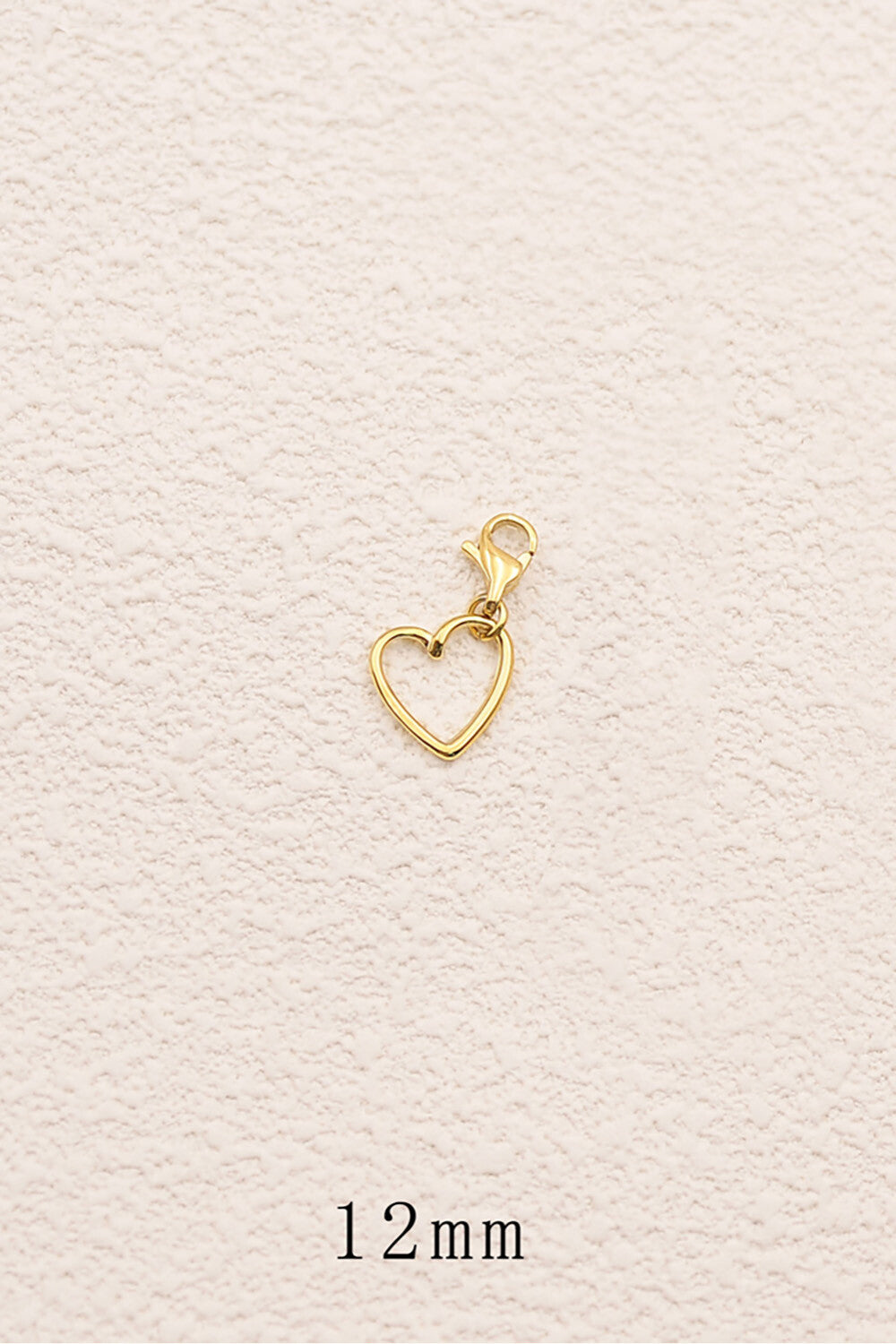Le charm "Coeur ajouré"