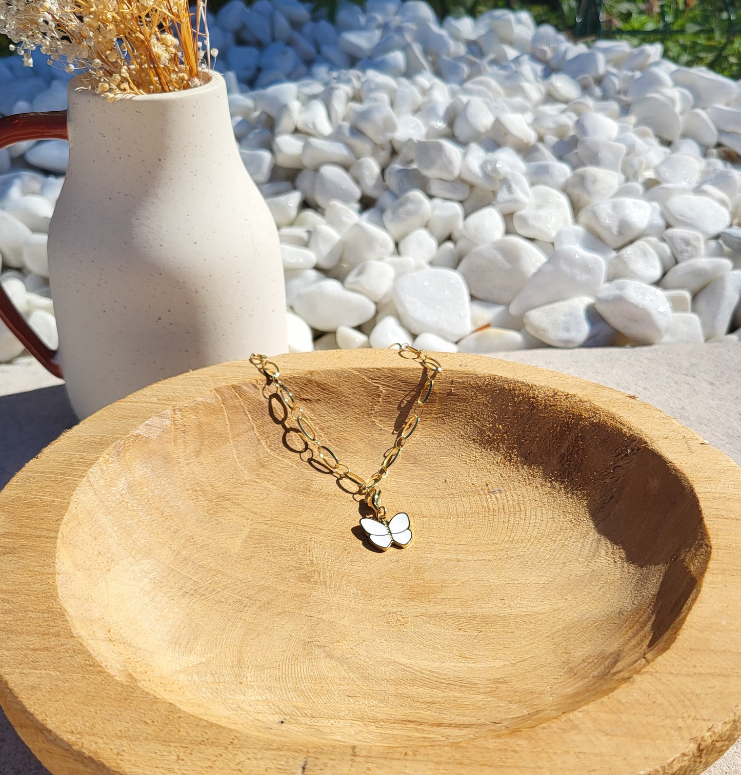 Le charm "Papillon en émail"
