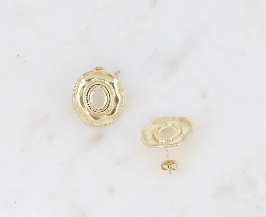 Les boucles d'oreilles AGLAE