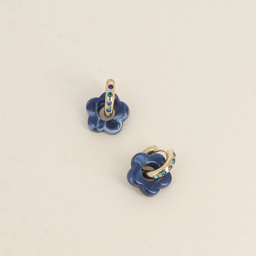 Les boucles d'oreilles OREVA