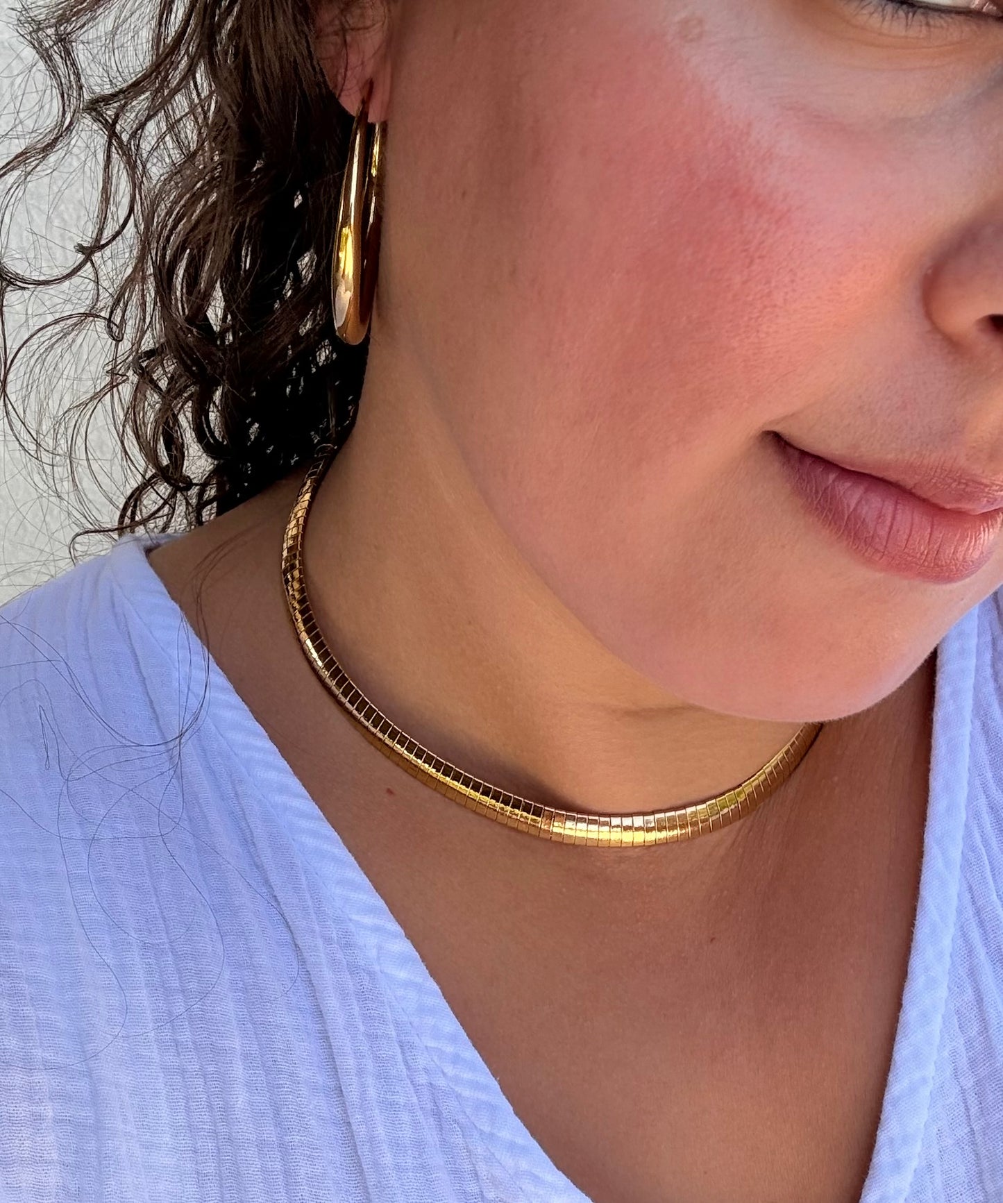Les boucles d'oreilles TINA