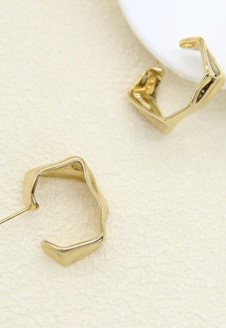 Les boucles d'oreilles CASSIANE