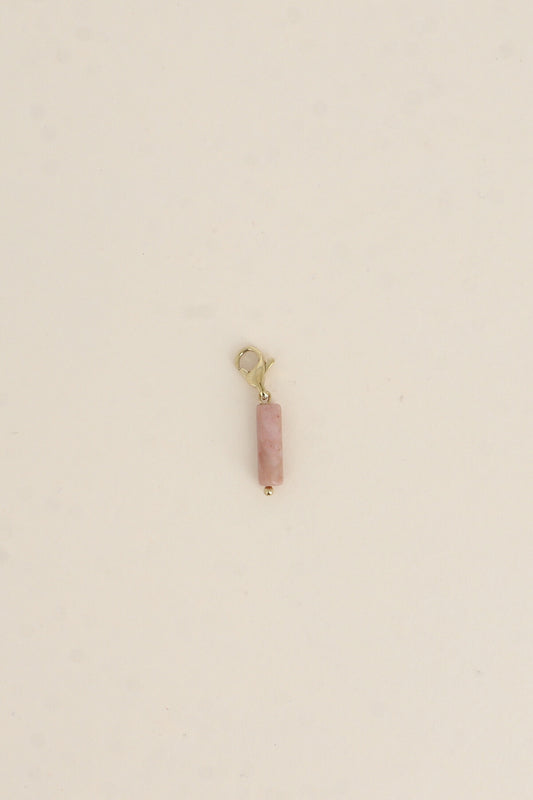 Le charm "cylindre" en rhodonite.